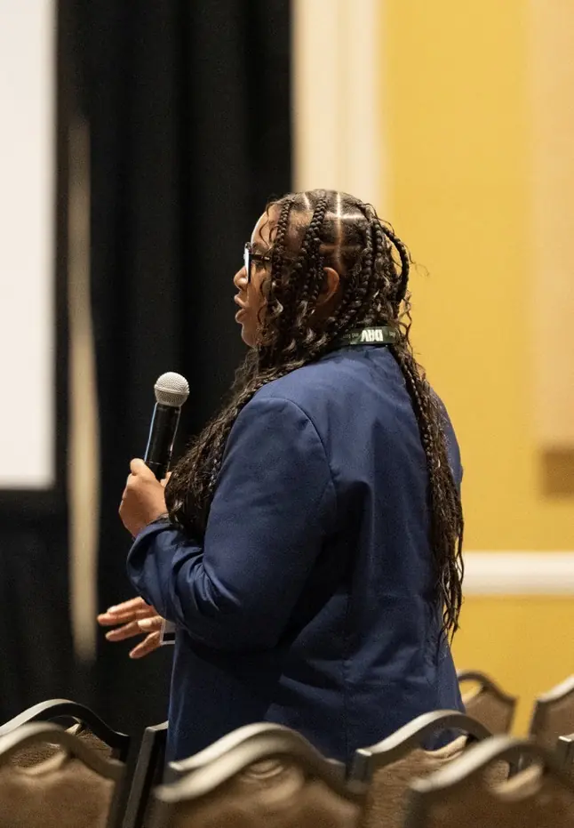 Members connect during convention sessions and gatherings.