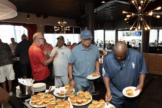 Convention attendees gather for food, conversation, and camaraderie.