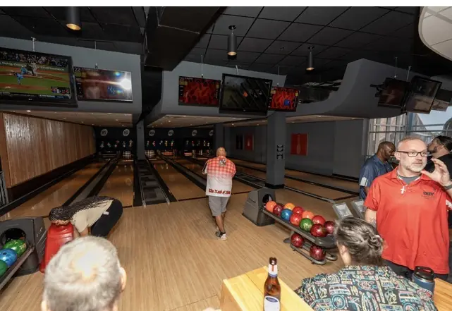 DAV members, families, and friends enjoy an Orlando bowling outing.