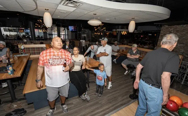 DAV members, families, and friends enjoy an Orlando bowling outing.