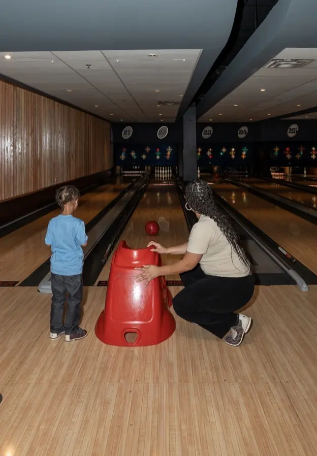 DAV members, families, and friends enjoy an Orlando bowling outing.