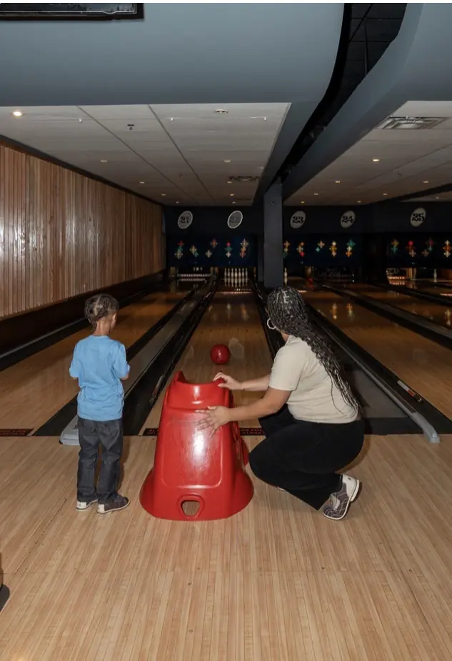 DAV members, families, and friends enjoy an Orlando bowling outing.
