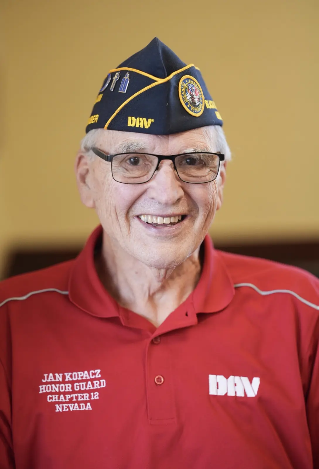 Portrait of Jan Kopacz in his DAV garrison cap and red Chapter 12 Honor Guard polo.